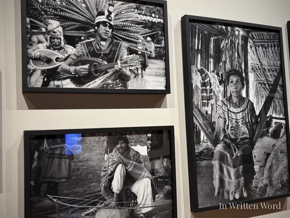 Black and white photographs of Indigenous Mexican communities displayed at Museo Nacional de Antropología in Mexico City.